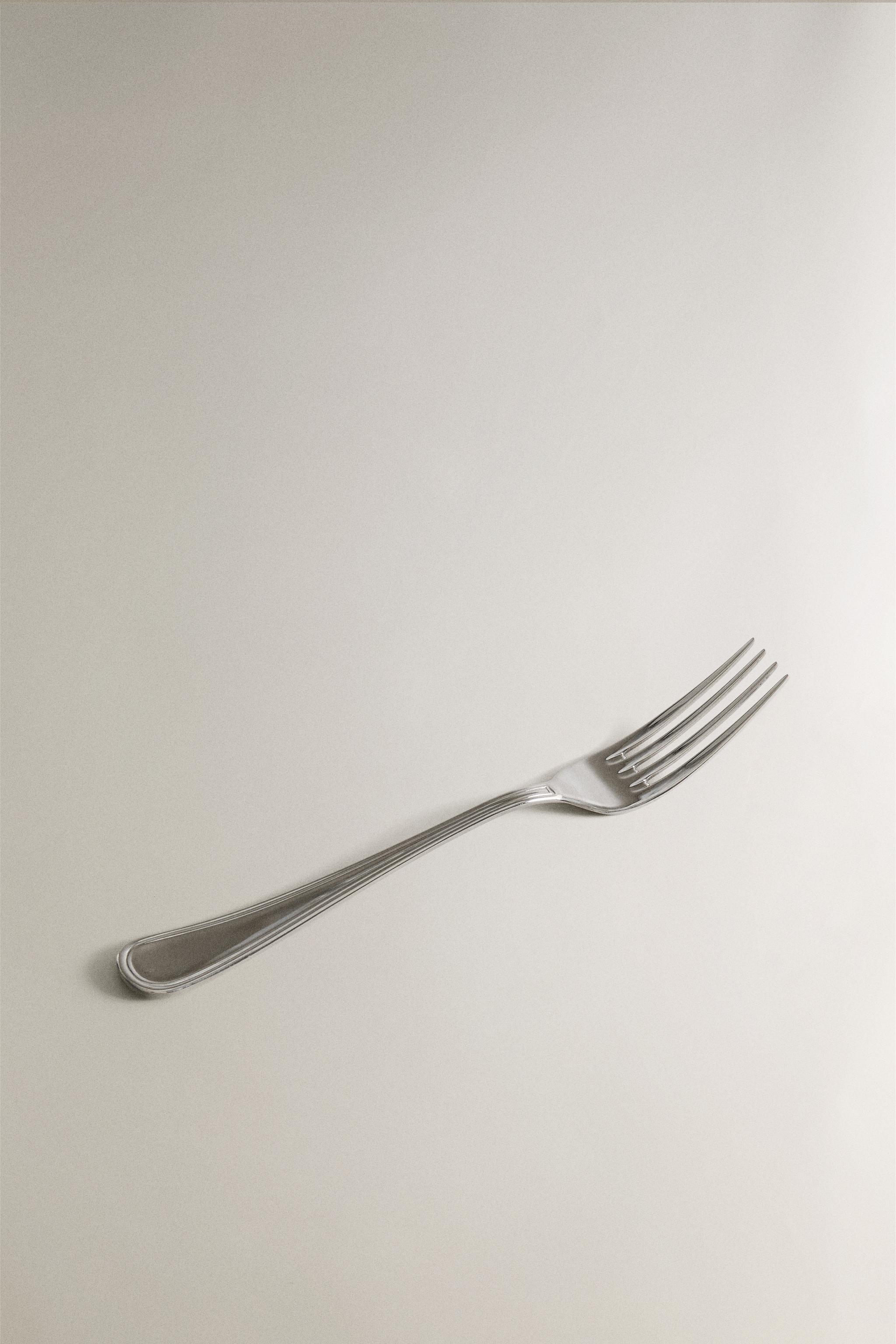 FOURCHETTE EN ACIER BRILLANT